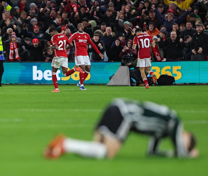 Three players from Nottingham Forest pictured celebrating a goal during a 2-1 win over Manchester United in December 2023